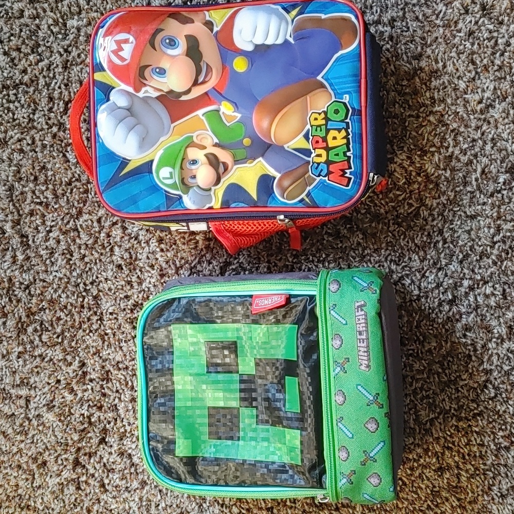 Like new Minecraft & Mario Bros lunch boxes